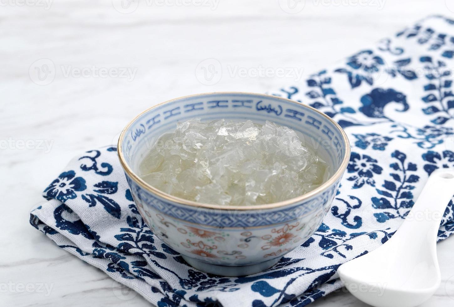 Bird Nest Soup, Asian Cuisine for Healthy Body, Rich of Collagen. On White table photo