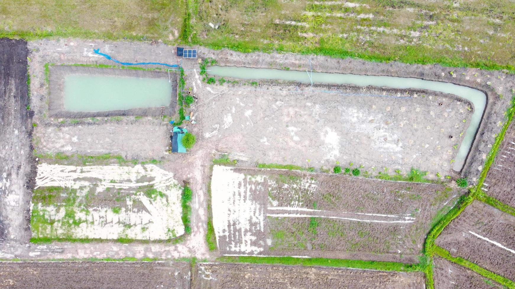 Aerial view of green fields and farmlands in rural Thailand. photo