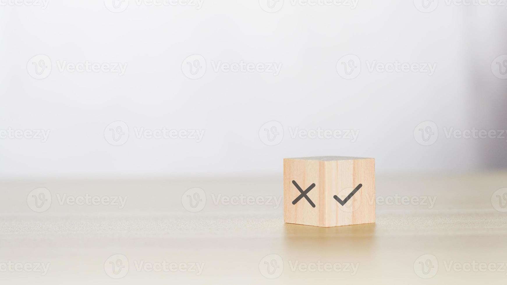 Yes or no concept. The true or false symbol on a cube wooden block. photo