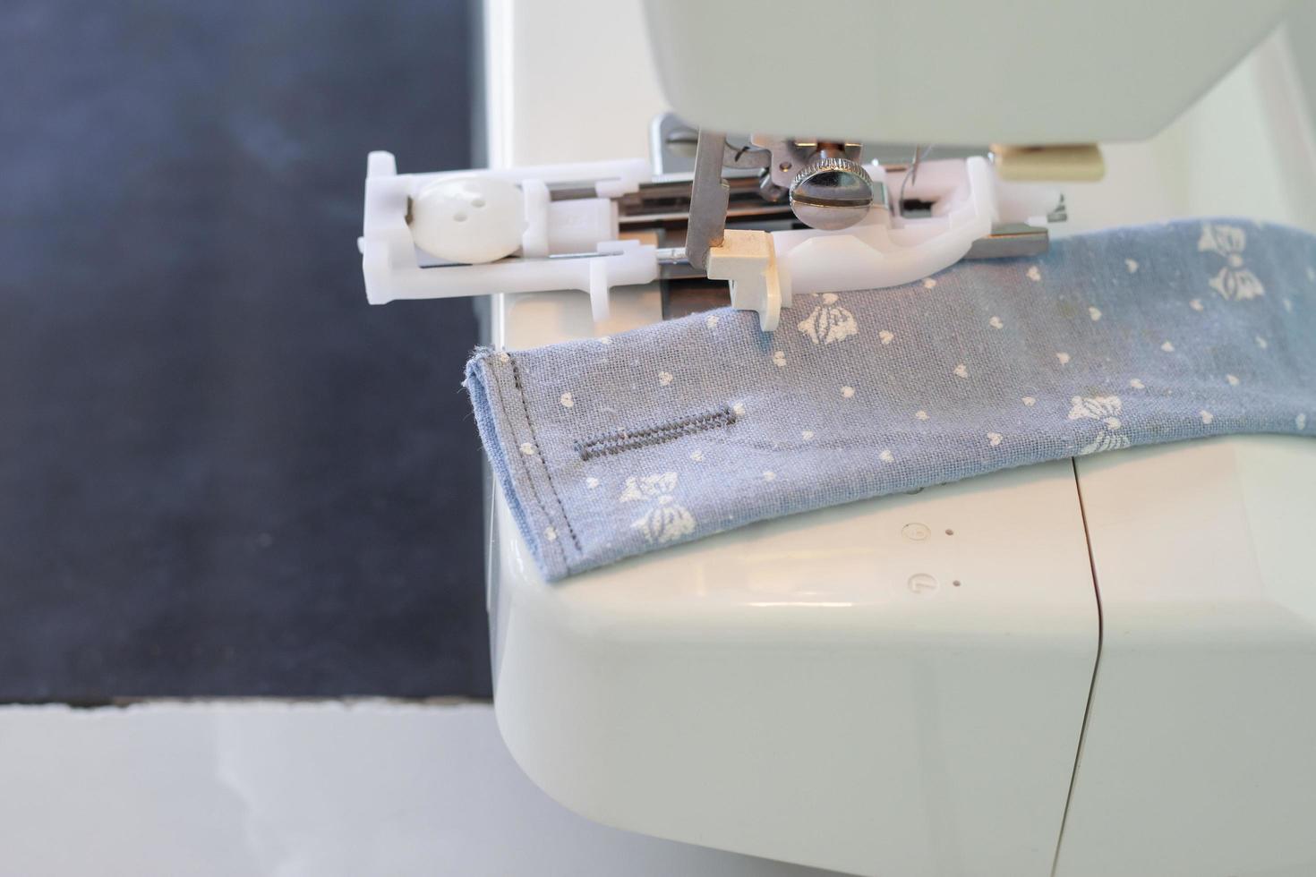 Buttonholes sewn with a sewing machine is technology that makes sewing faster and easier. photo