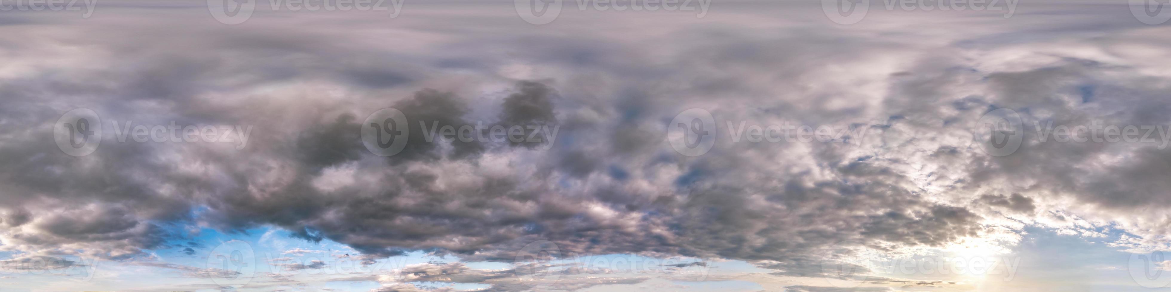 Seamless cloudy blue evening sky hdri panorama 360 degrees angle view before sunset with zenith and beautiful clouds in equirectangular projection for use in 3d graphics as sky dome or edit drone shot photo
