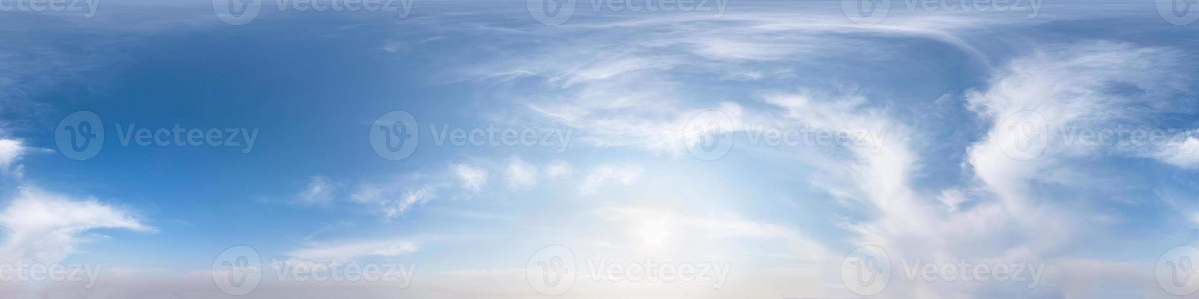 Seamless hdri panorama 360 degrees angle view blue sky with beautiful fluffy cumulus clouds with zenith for use in 3d graphics or game development as sky dome or edit drone shot photo