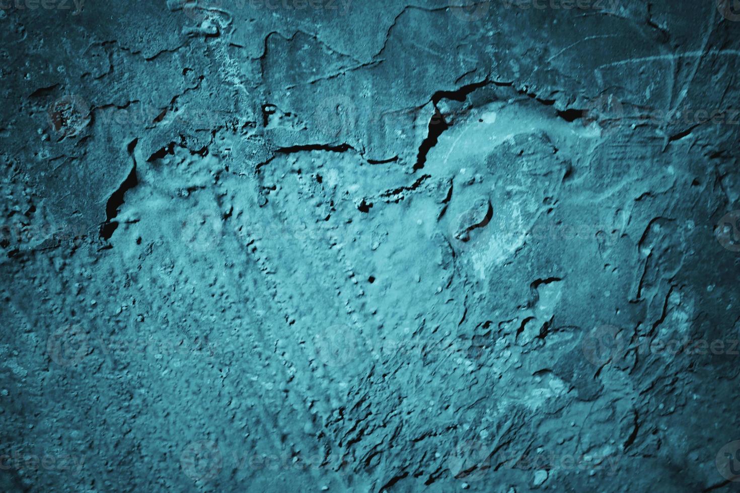 Abstract grunge blue stucco wall background. Dark stone wall concept background with space for text. photo