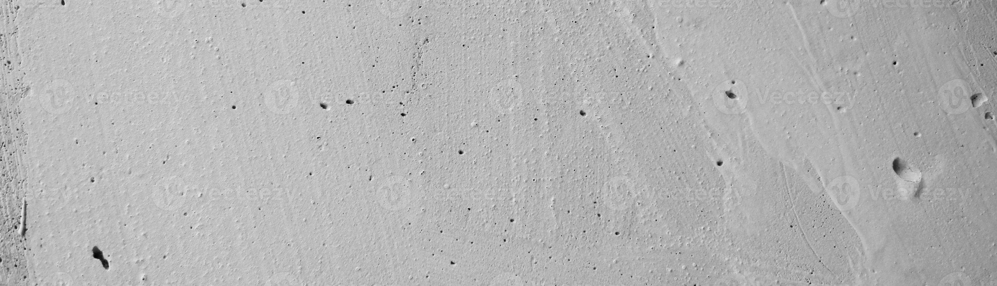 Panoramic concrete wall texture can be used as a background. Grey wall texture photo