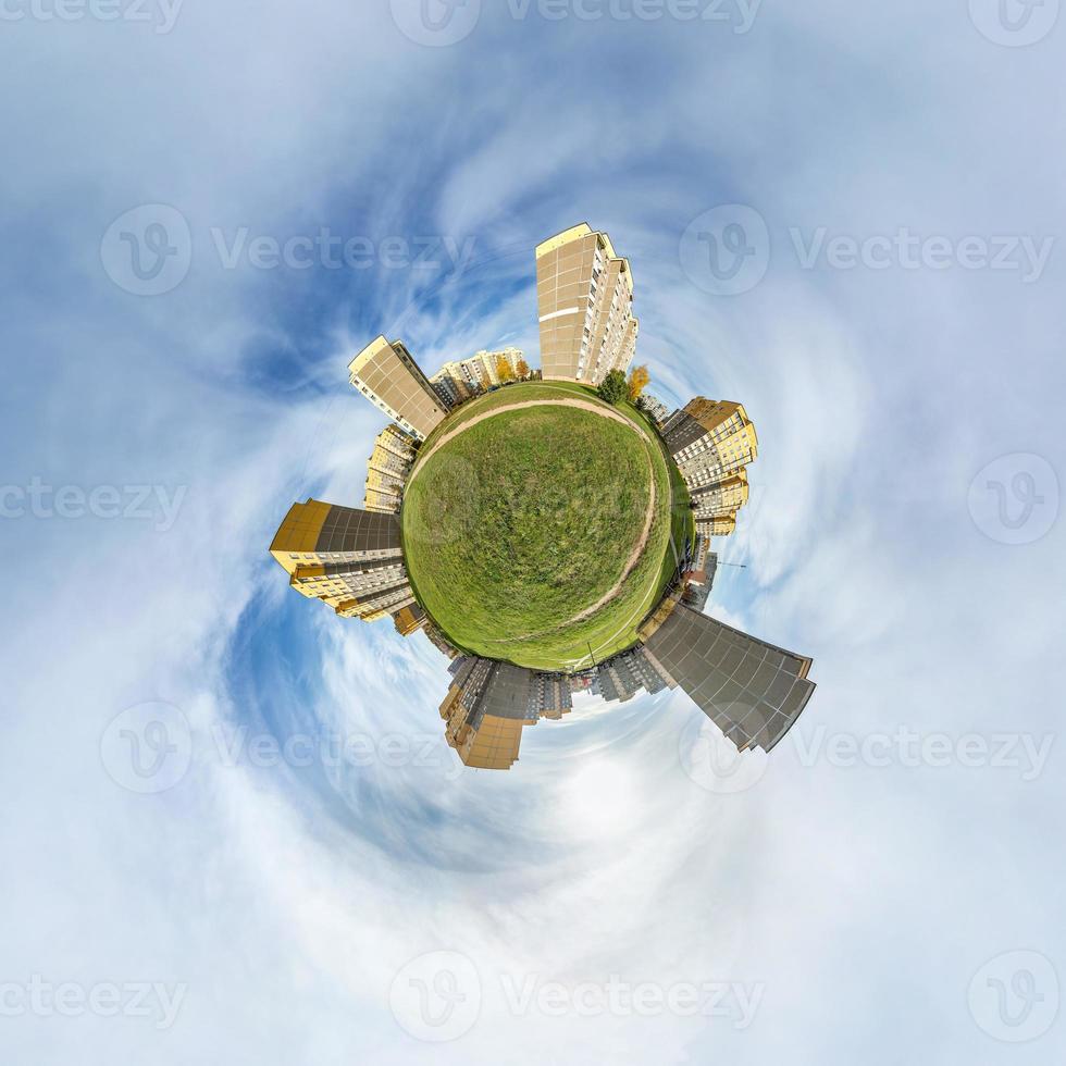 Little planet transformation of spherical panorama 360 degrees. Spherical abstract aerial view high-rise building area urban development residential quarter. Curvature of space. photo