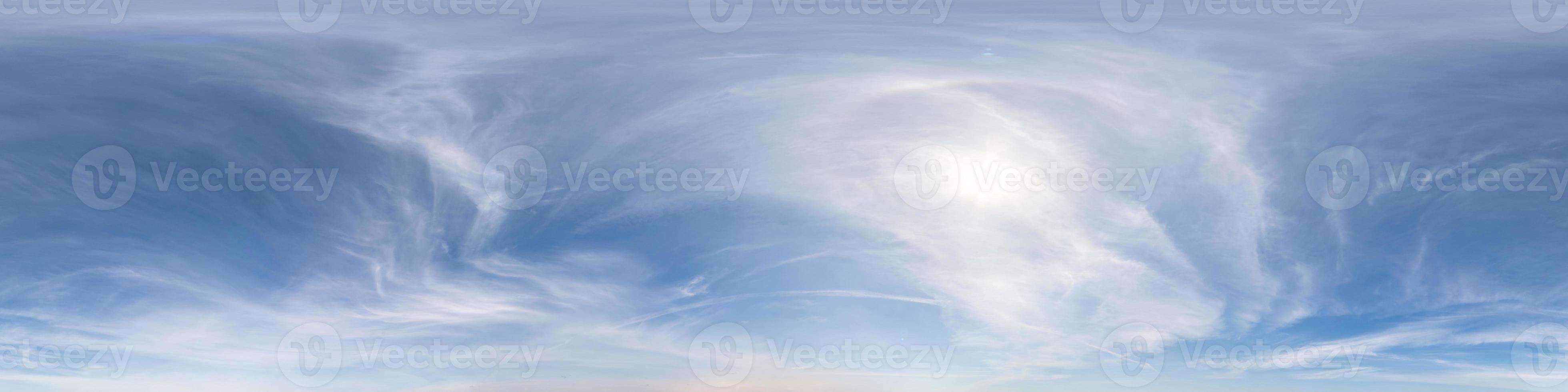 clear blue sky with halo sun. Seamless hdri panorama 360 degrees angle view with zenith for use in 3d graphics or game development as sky dome or edit drone shot photo