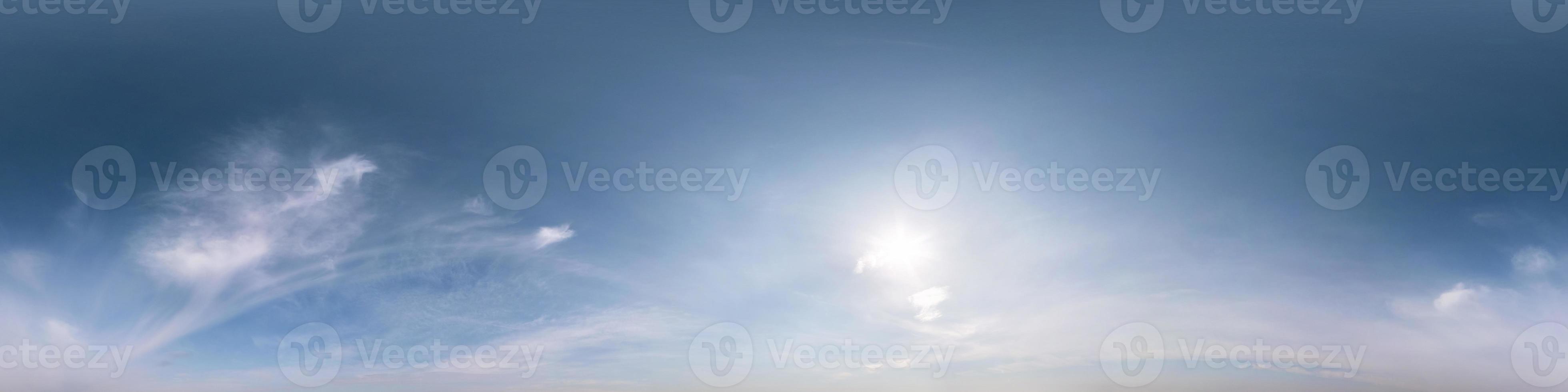 Seamless hdri panorama 360 degrees angle view blue sky with beautiful fluffy cumulus clouds with zenith for use in 3d graphics or game development as sky dome or edit drone shot photo