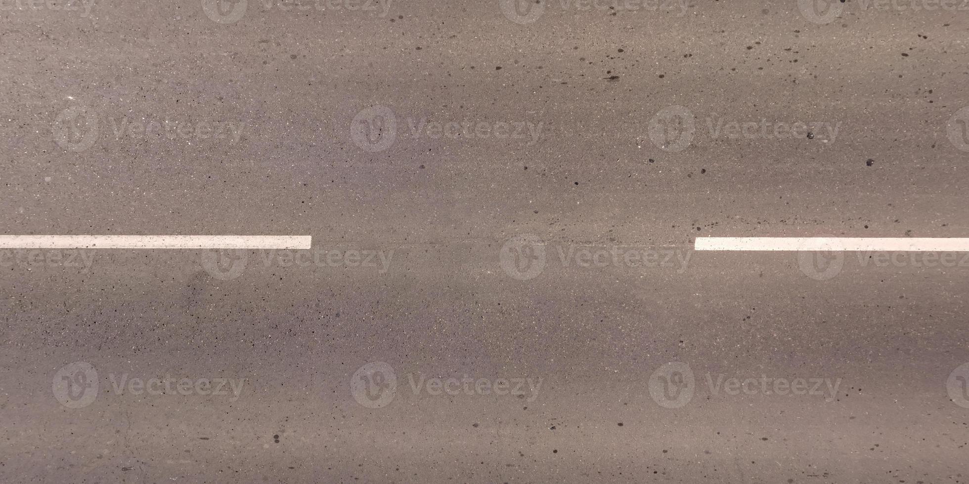 view from above on texture of asphalt road photo