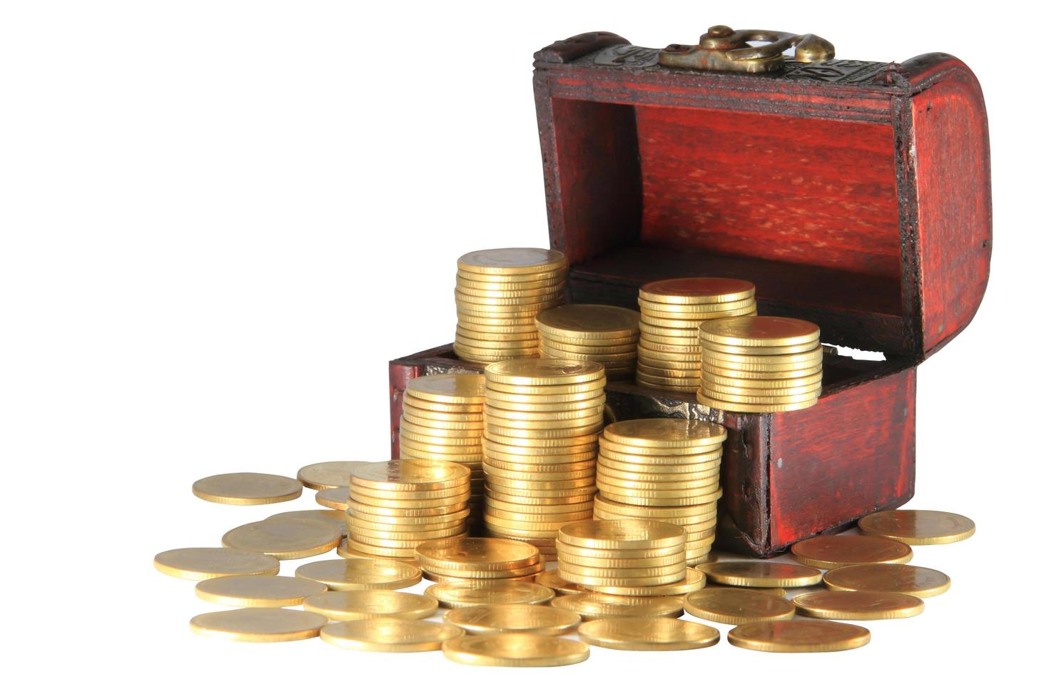 A wooden ancient chest full of money photo