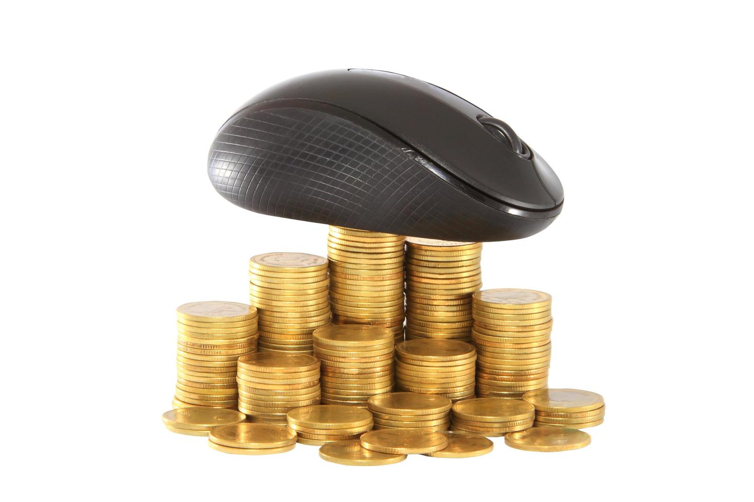 black  computer mouse and golden coin photo