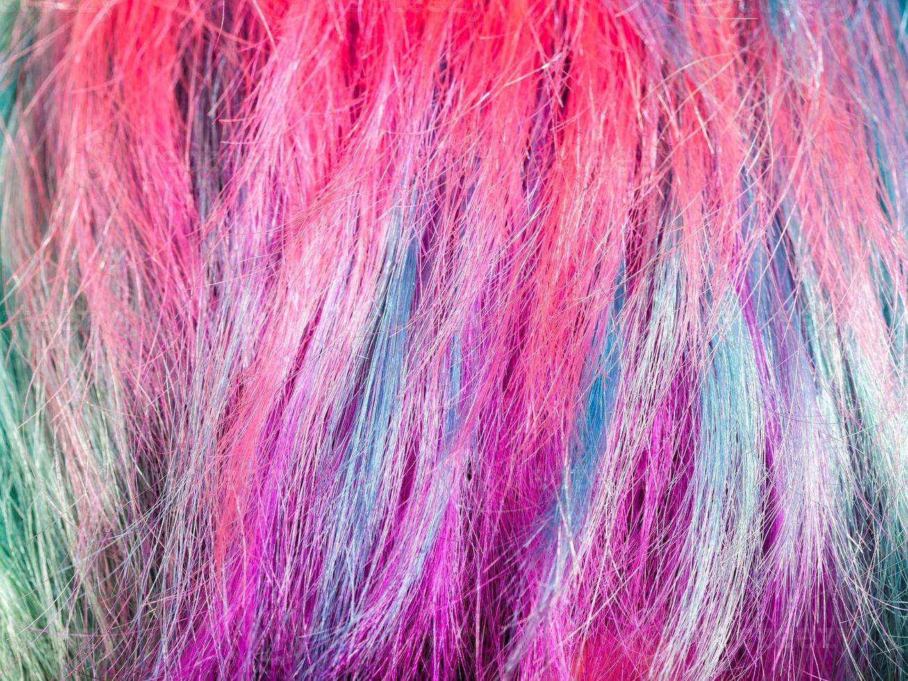 colorful dyed strands of female hairs photo