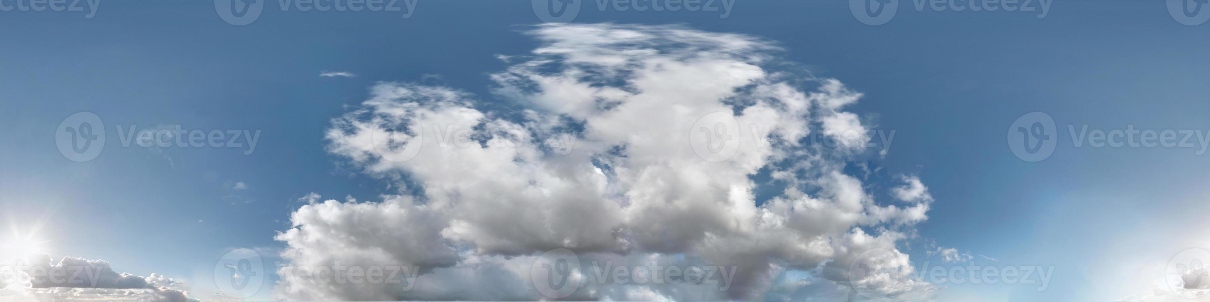 blue sky with beautiful cumulus clouds. Seamless hdri panorama 360 degrees angle view  with zenith for use in 3d graphics or game development as sky dome or edit drone shot photo