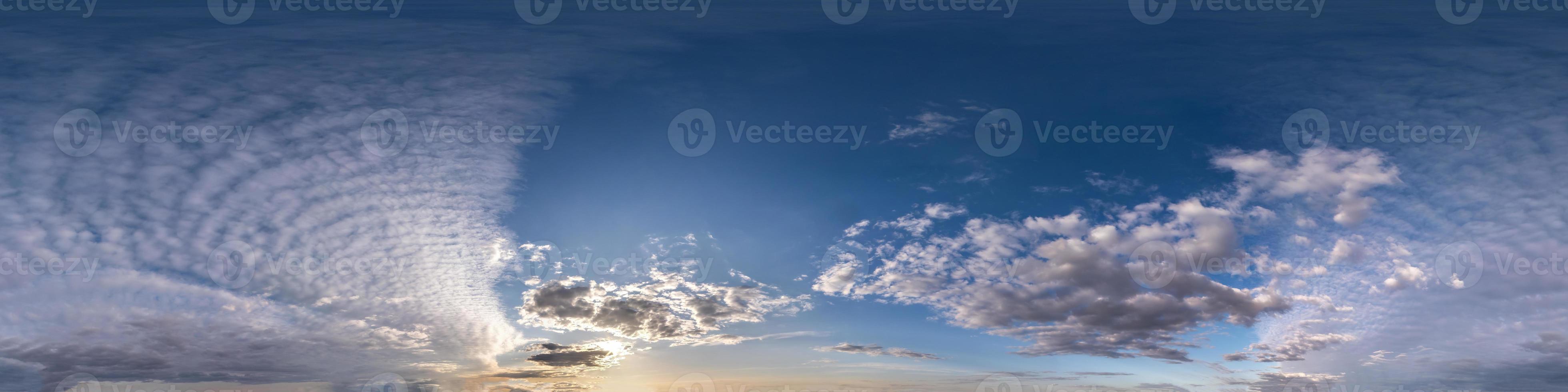 dark blue evening sky before sunset with beautiful awesome clouds. Seamless hdri panorama 360 degrees angle view with zenith for use in graphics or game development as sky dome or edit drone shot photo