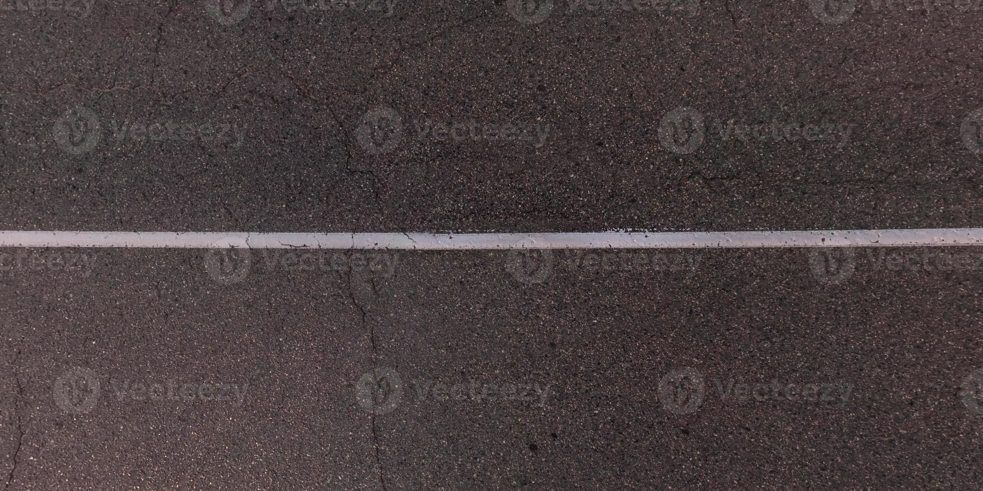 top view from above on texture of old asphalt road photo