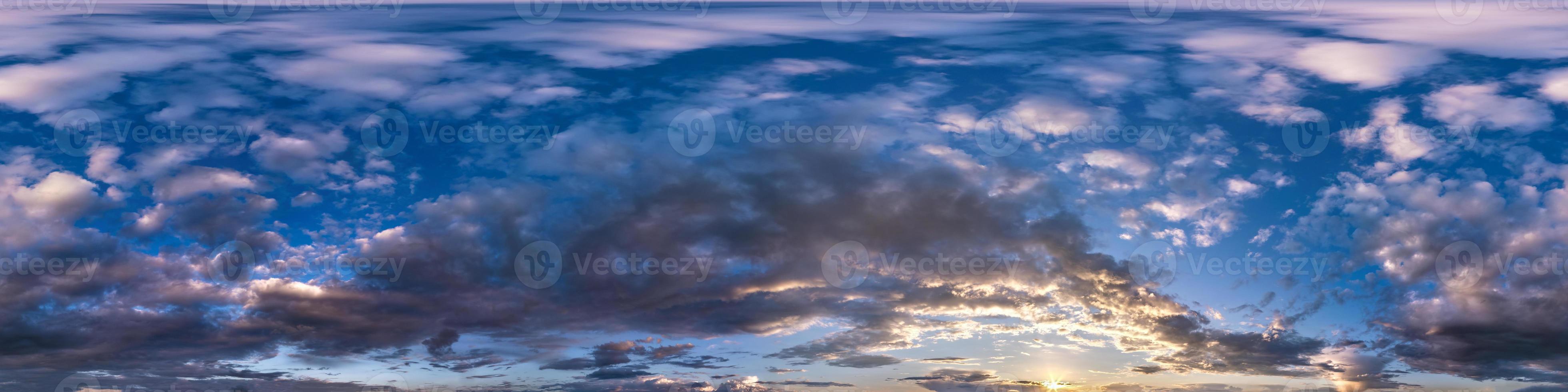 Seamless hdri panorama 360 degrees angle view blue pink evening sky with beautiful clouds before sunset with zenith for use in 3d graphics or game development as sky dome or edit drone shot photo