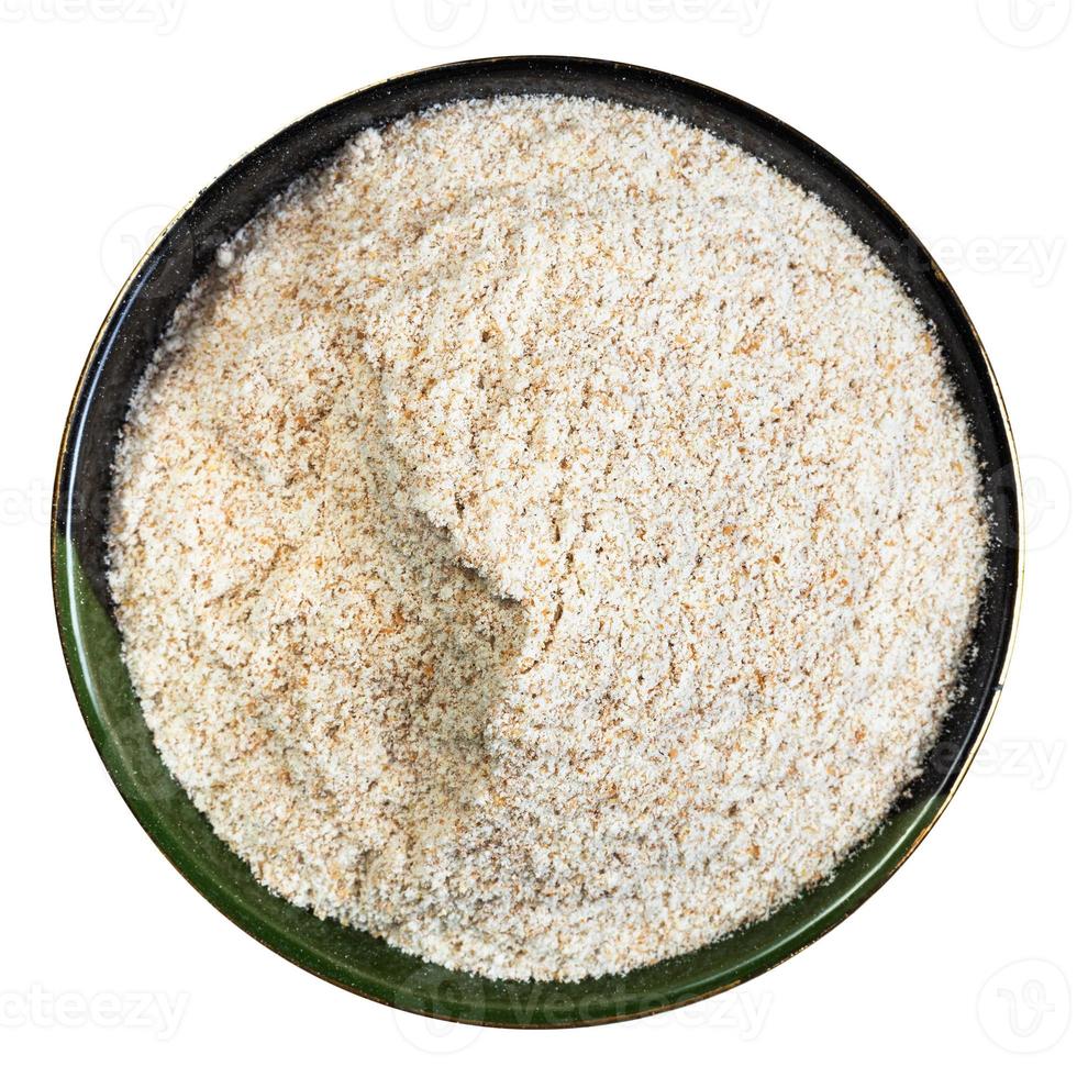 whole-grain wheat flour in round bowl isolated photo