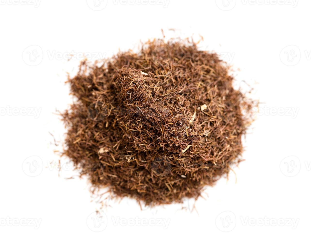 pile of grinded dried corn silk close up on white photo