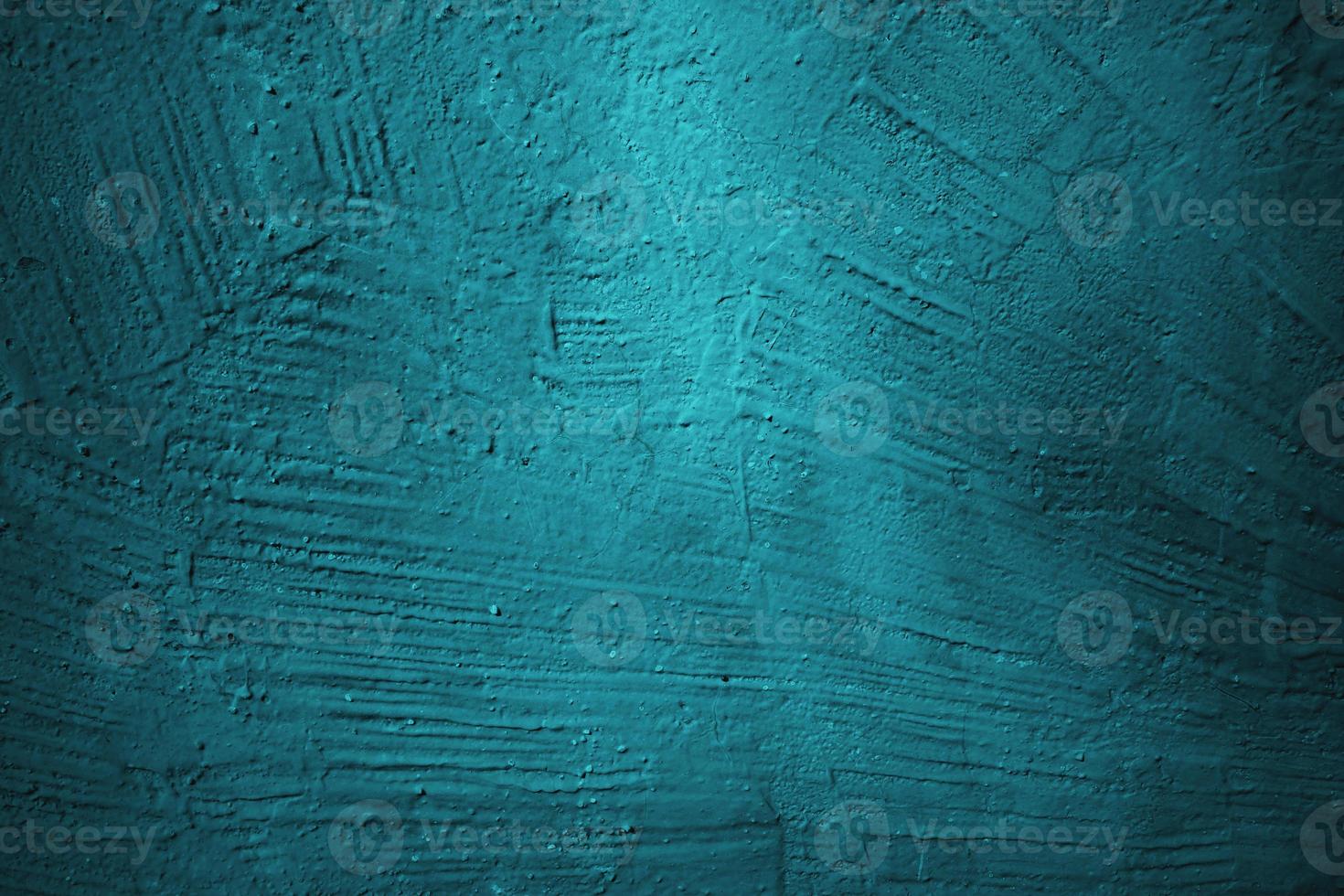 Abstract grunge blue stucco wall background. Dark stone wall concept background with space for text. photo