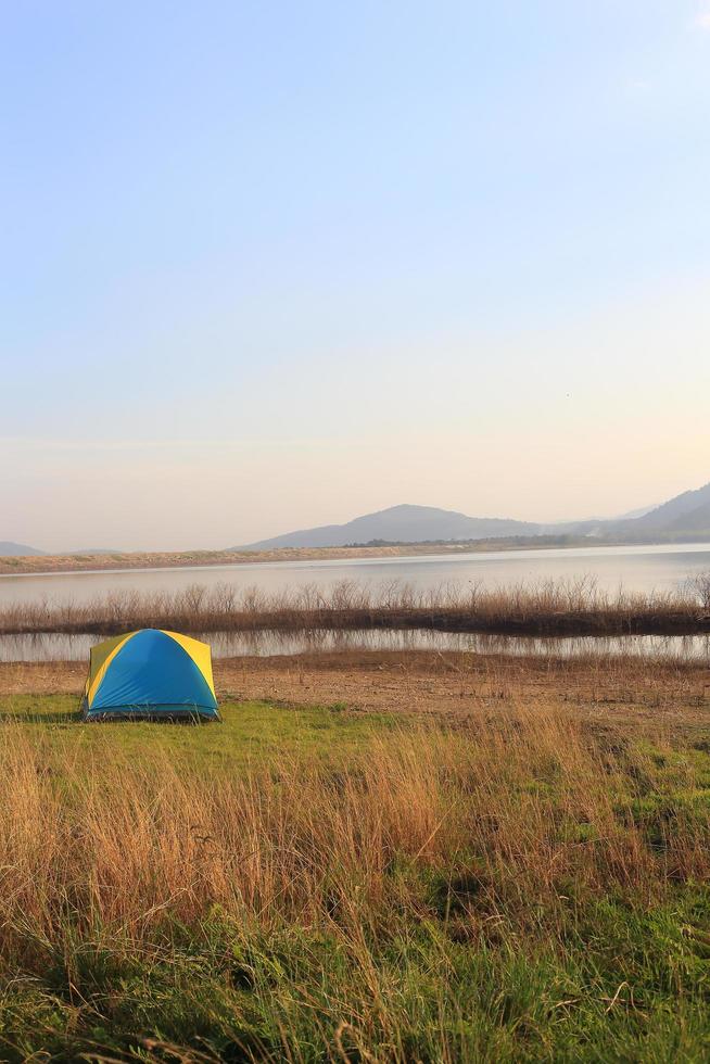 Camping place beside the lake photo