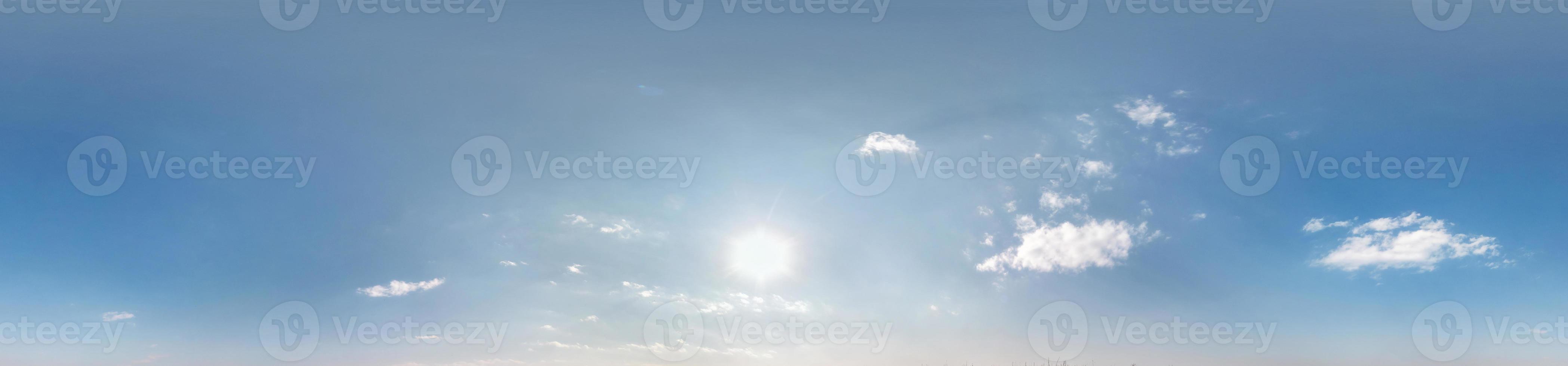 Seamless cloudy blue sky hdri panorama 360 degrees angle view with zenith and beautiful clouds for use in 3d graphics as sky dome photo