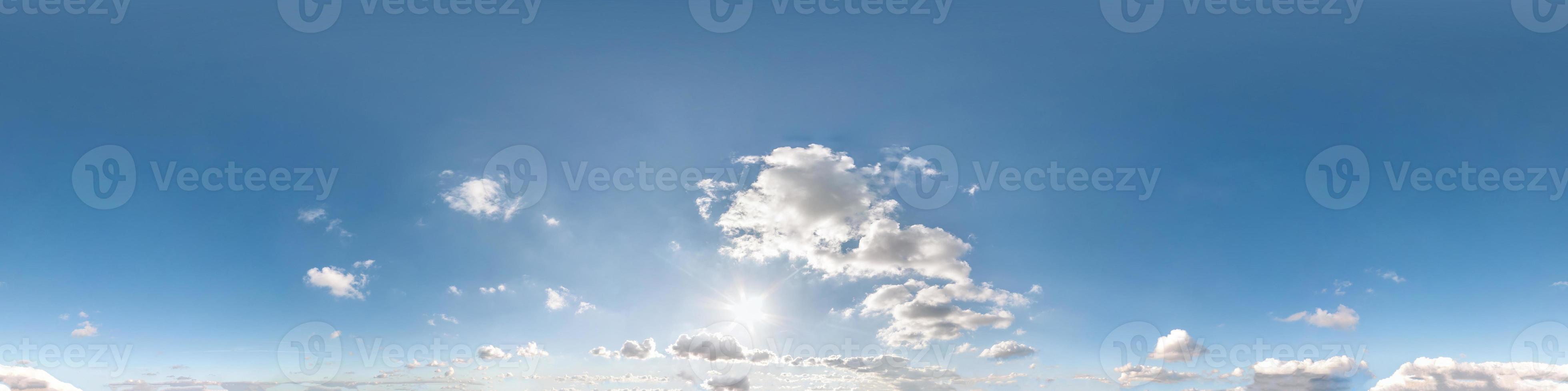 Seamless cloudy blue sky hdri panorama 360 degrees angle view with zenith and beautiful clouds for use in 3d graphics as sky dome or edit drone shot photo