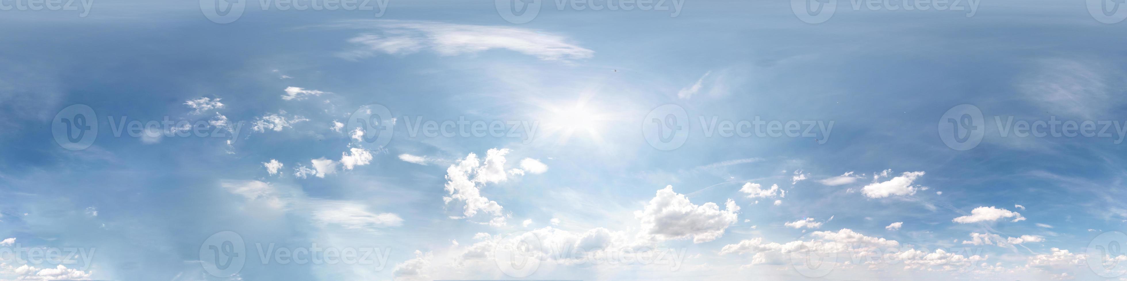 blue sky with beautiful cumulus clouds. Seamless hdri panorama 360 degrees angle view with zenith for use in 3d graphics or game development as sky dome or edit drone shot photo