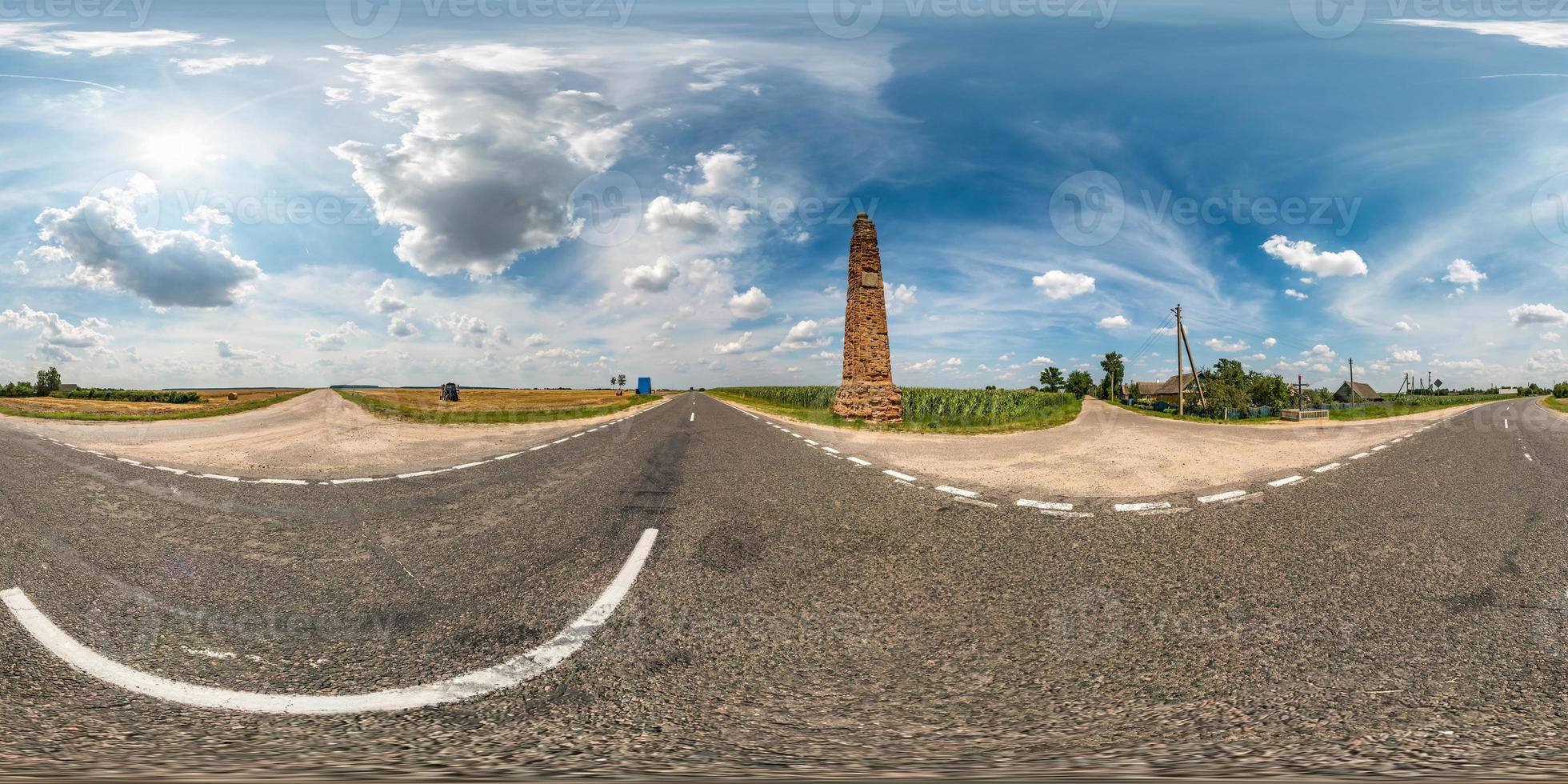 full seamless spherical hdri panorama 360 degrees angle view on asphault road near ancient stella in summer day with awesome clouds in equirectangular projection, for VR AR virtual reality content photo