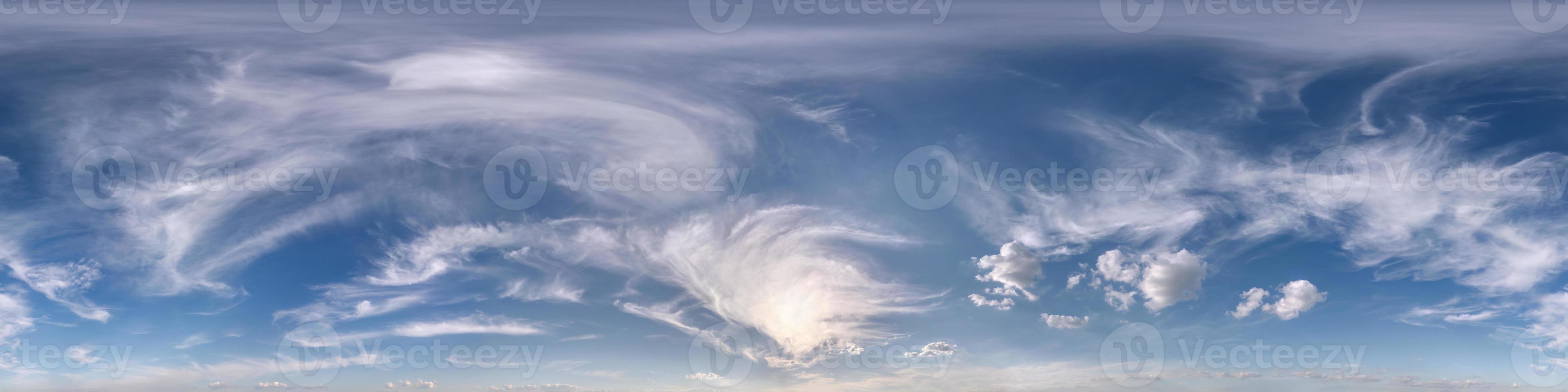 Seamless clear blue sky hdri panorama 360 degrees angle view with zenith and beautiful clouds for use in 3d graphics as sky dome or edit drone shot photo