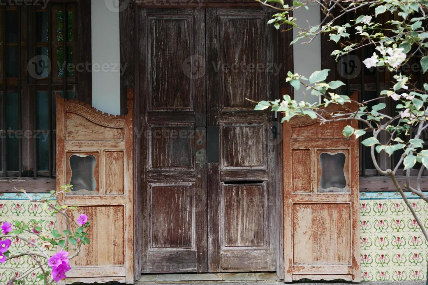 a brown wood old door in singapore photo