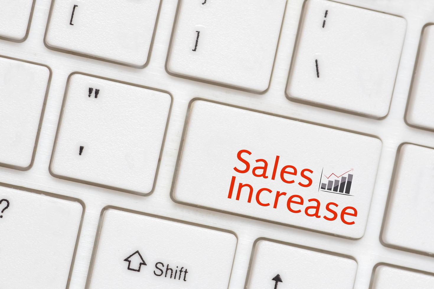 Sales Increase button on Computer Keyboard photo