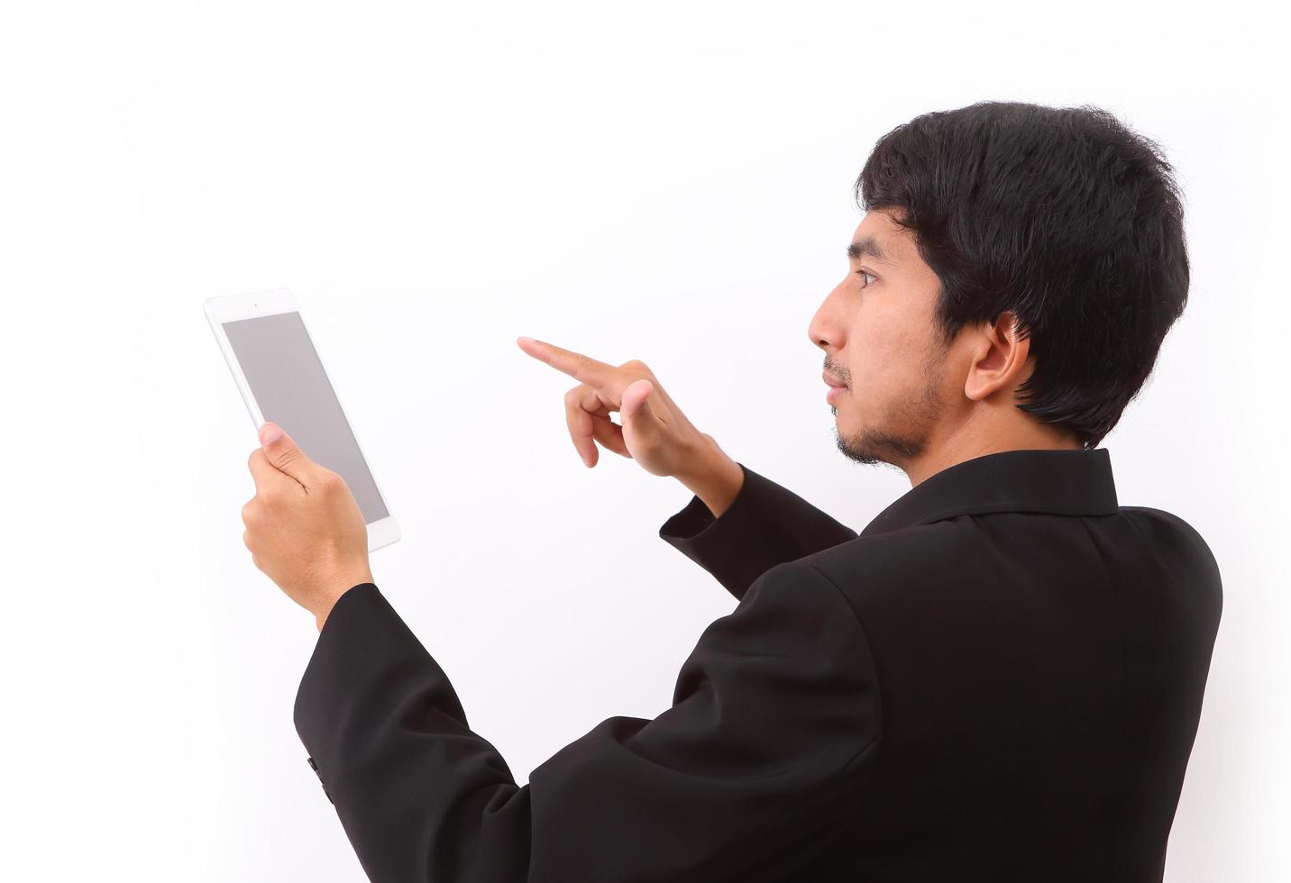 Happy man using digital tablet photo