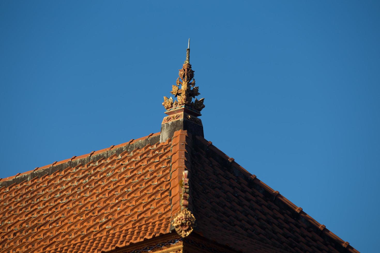 Historic carving at Pura Ulun Danu Bratan Water Temple Bali, Indonesia photo