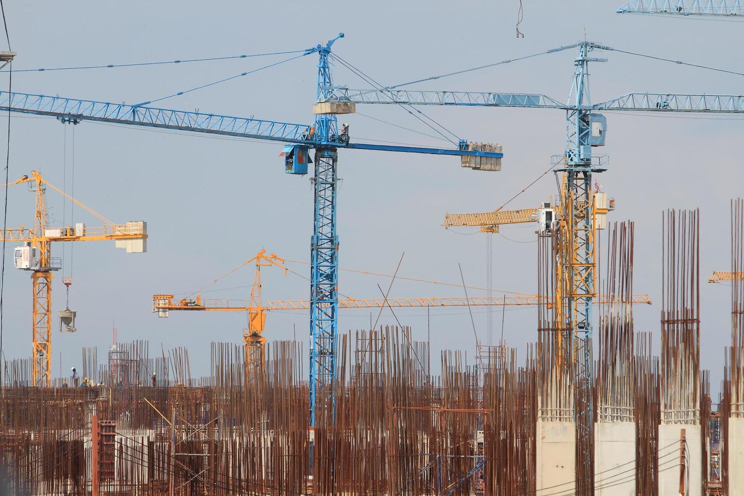 Construction site with enforced concrete steel frames rising up photo