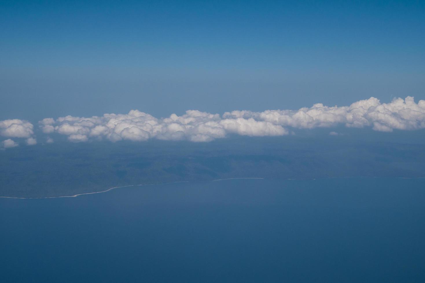 blue sky and clouds on plane photo