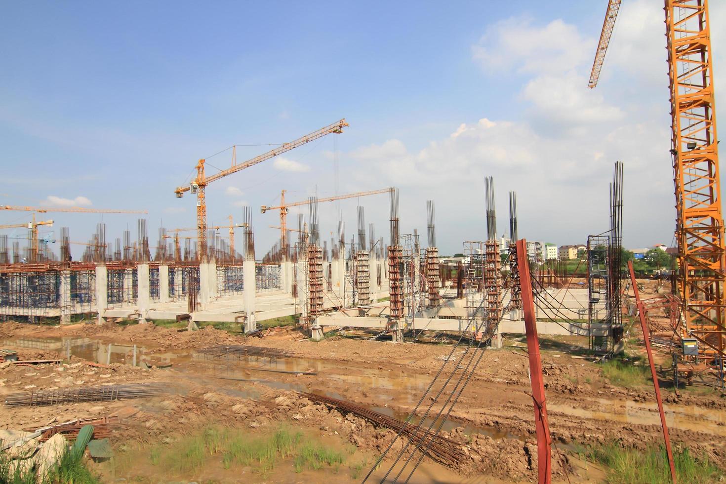 Construction site with enforced concrete steel frames rising up photo