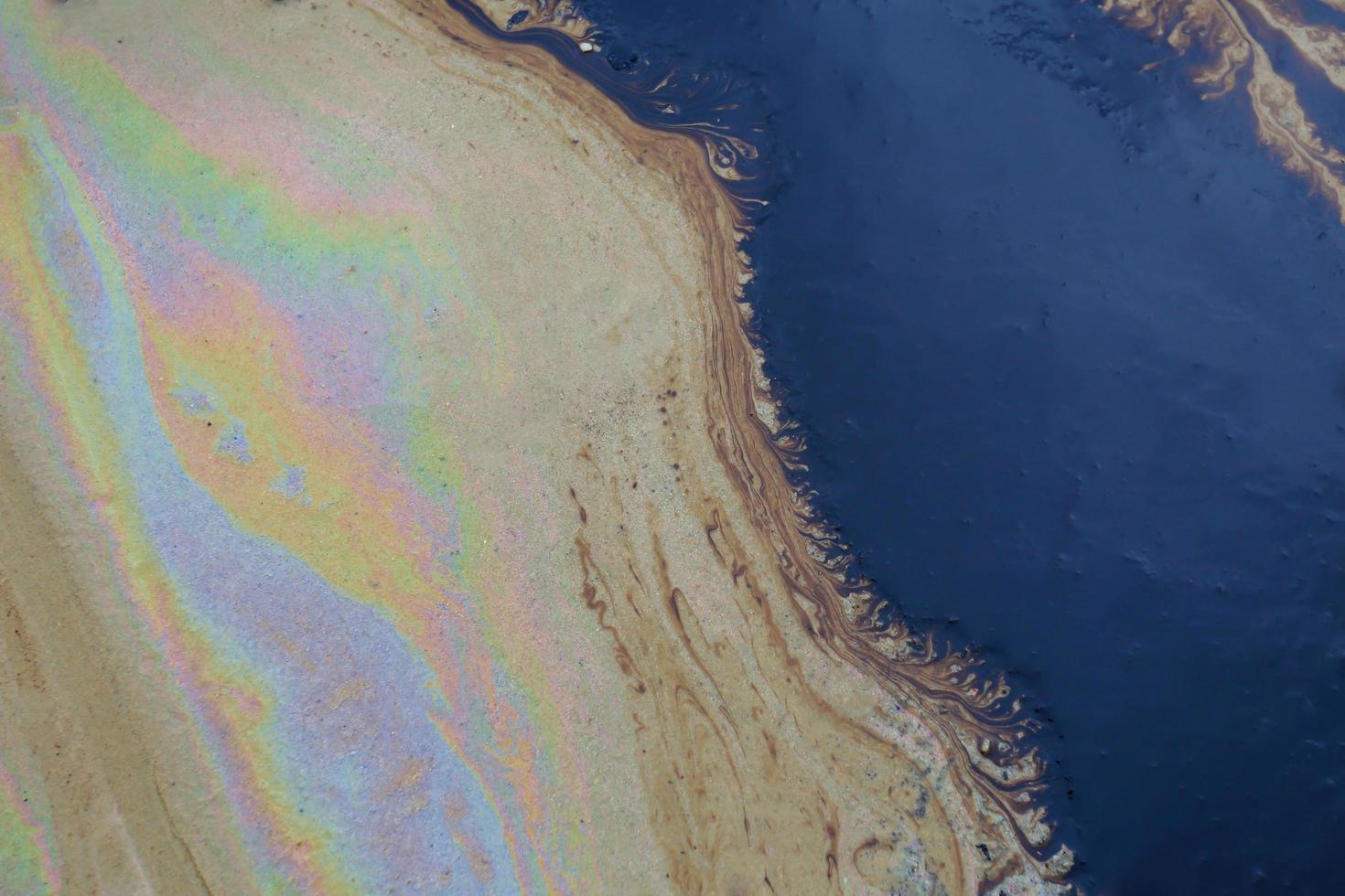 Gulf oil spill is shown on a beach photo