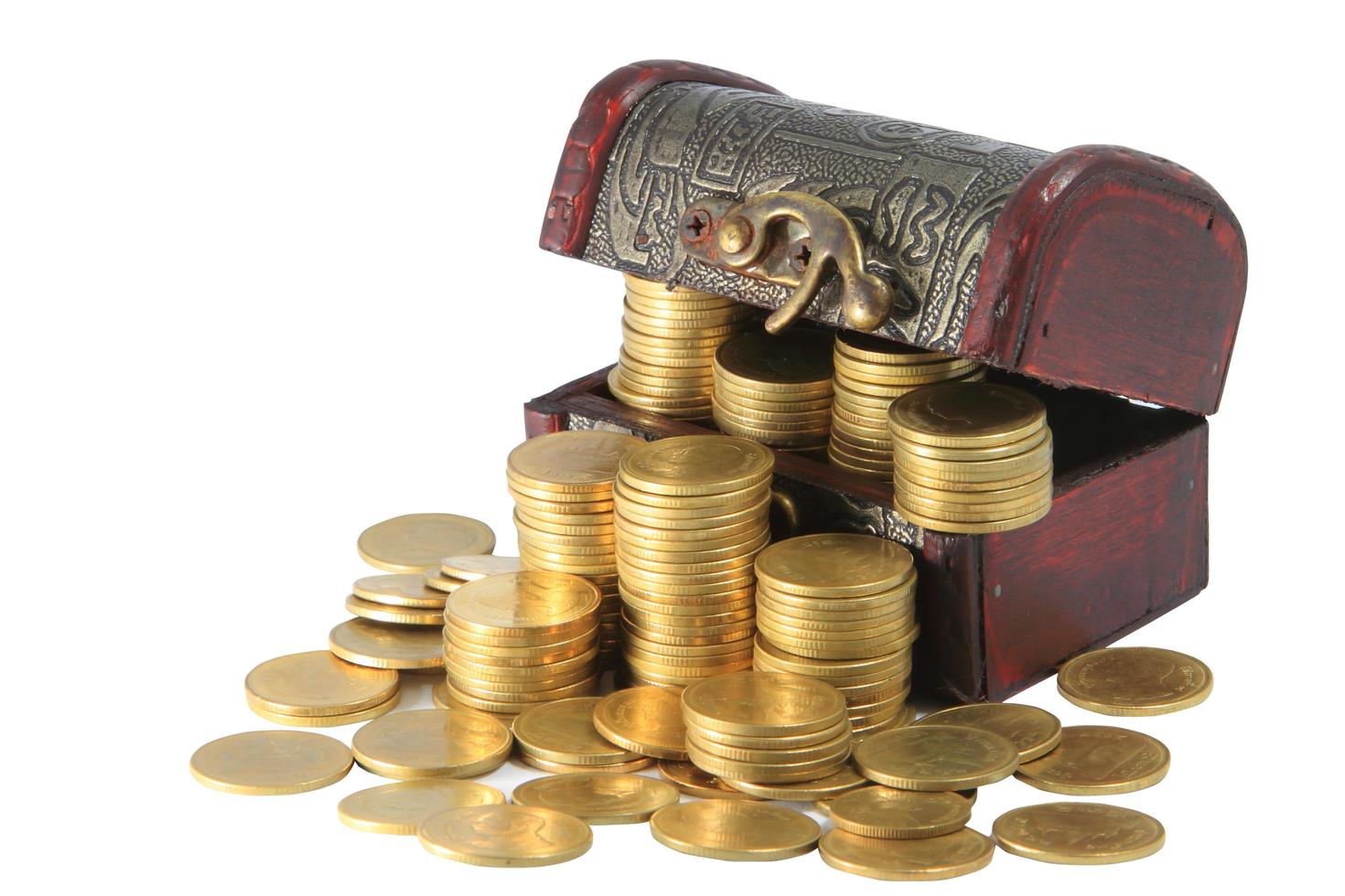 A wooden ancient chest full of money photo