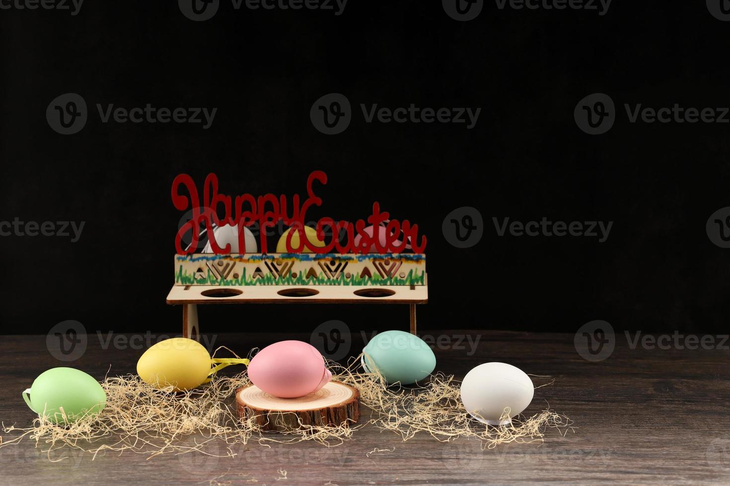 Easter rabbit with colorful eggs photo