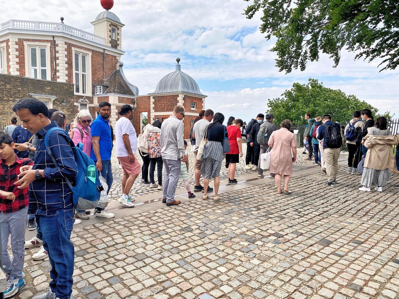 London in the UK in June 2022. A view of Tourists in Greenwich in London photo