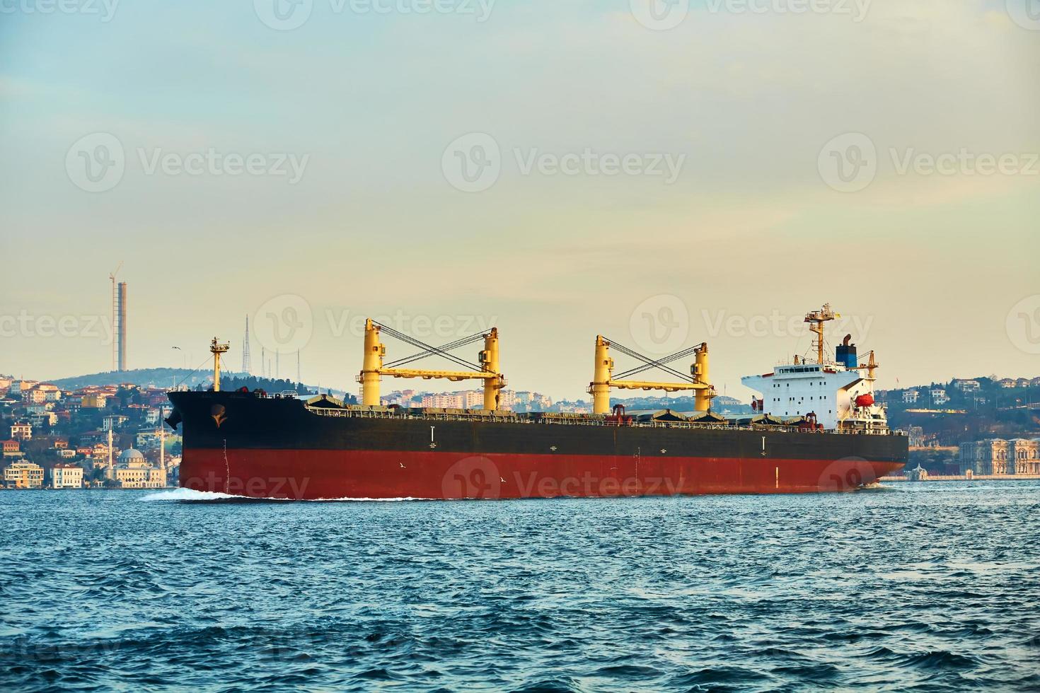 Bulk carrier in Bosphorus Strait, Istanbul, Turkey photo