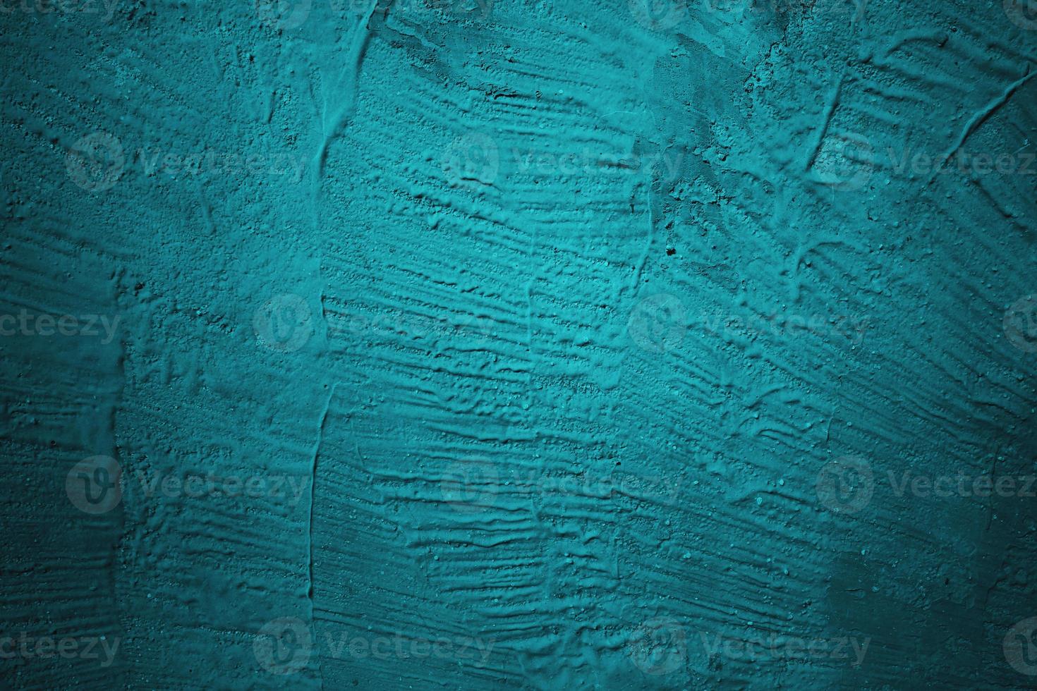 Abstract grunge blue stucco wall background. Dark stone wall concept background with space for text. photo