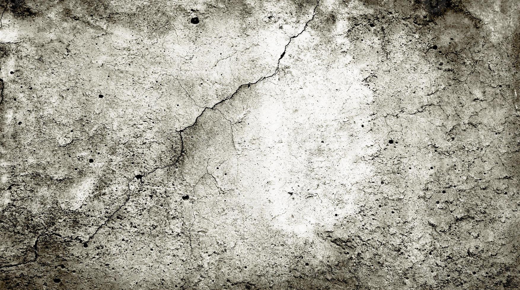 Old paper, old concrete, old wall texture with dark edges, stains, and cracks. photo