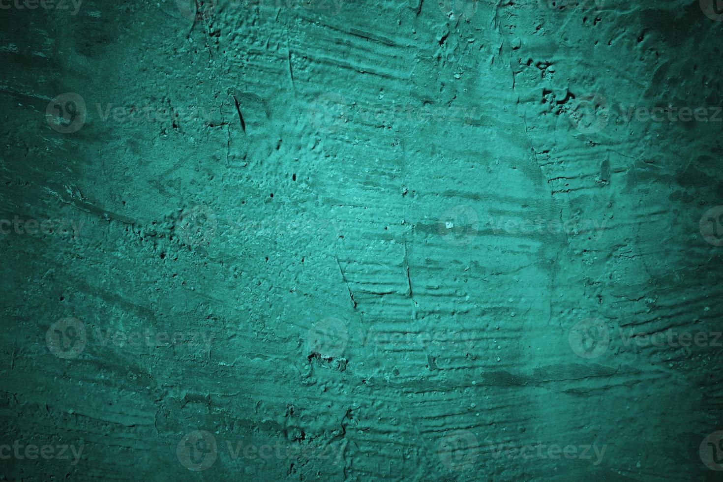 Abstract grunge blue stucco wall background. Dark stone wall concept background with space for text. photo