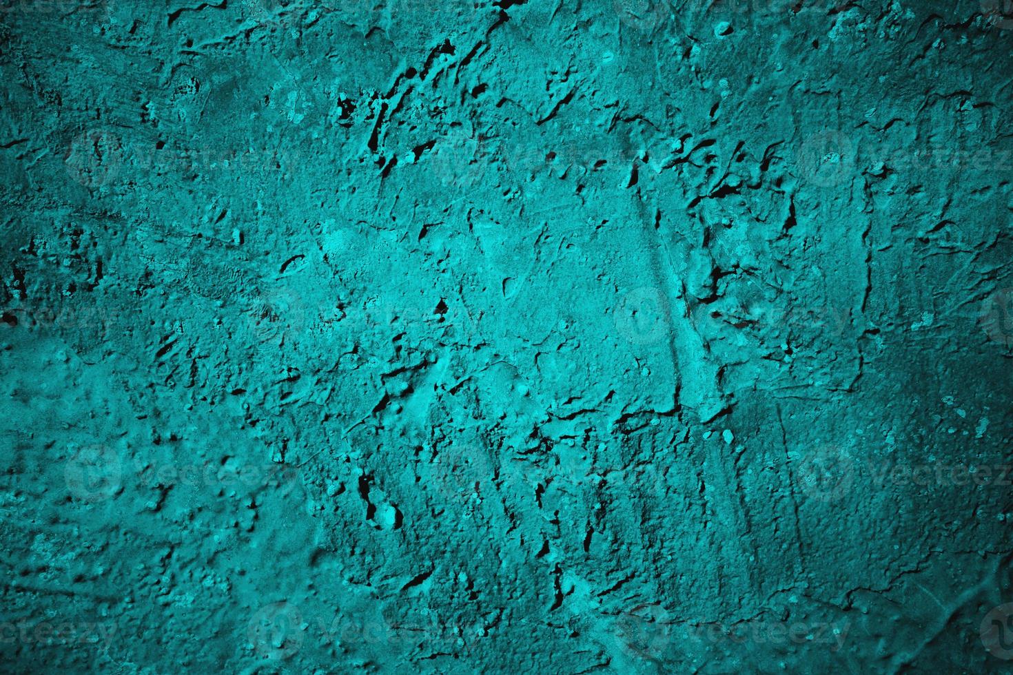 Abstract grunge blue stucco wall background. Dark stone wall concept background with space for text. photo