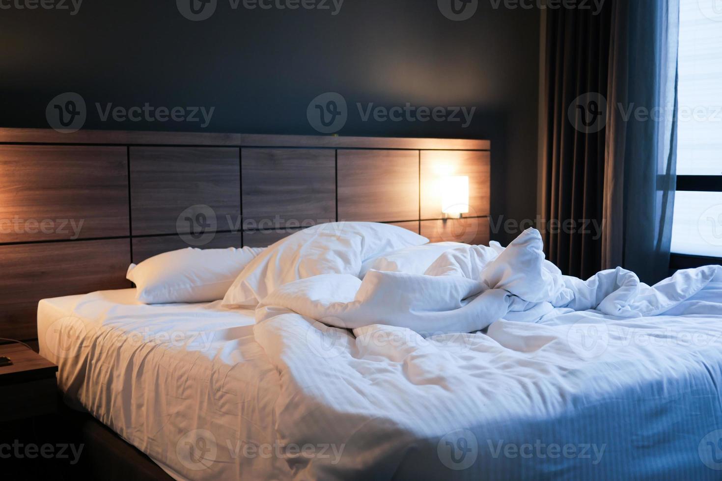 messy bed in early morning , messy bed after waking up photo
