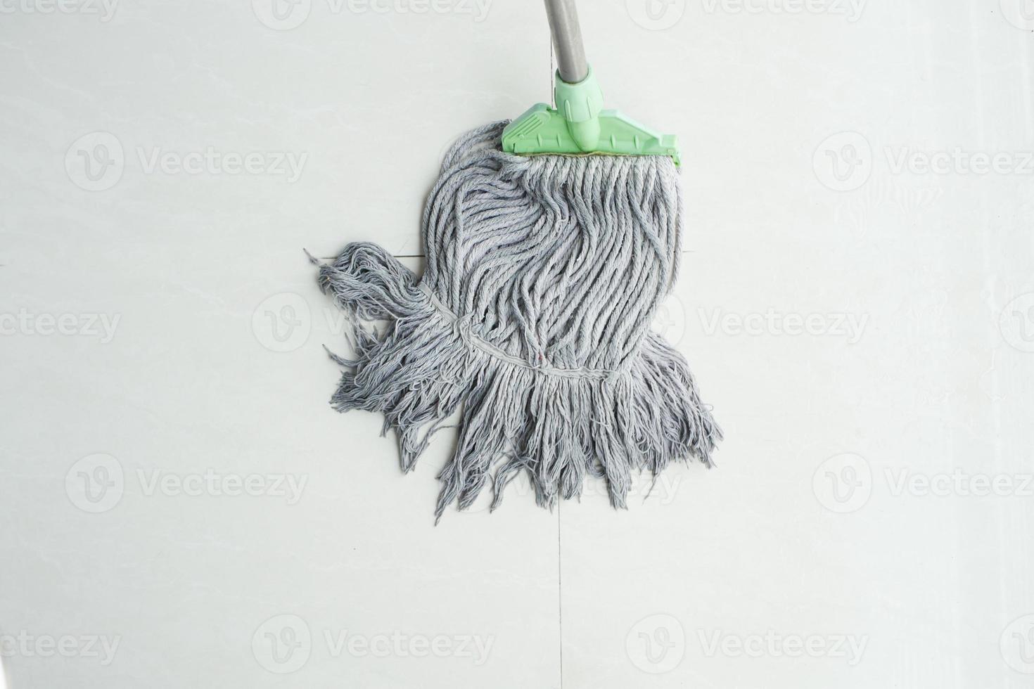 Clean tile floors with mops and floor cleaning products. 3320470 Stock  Photo at Vecteezy