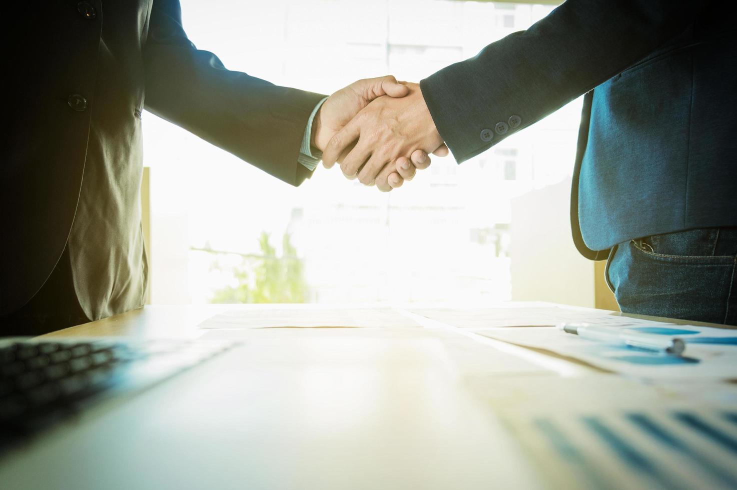 Business partnership meeting concept. Image businessmans handshake. Successful businessmen handshaking after good deal. photo