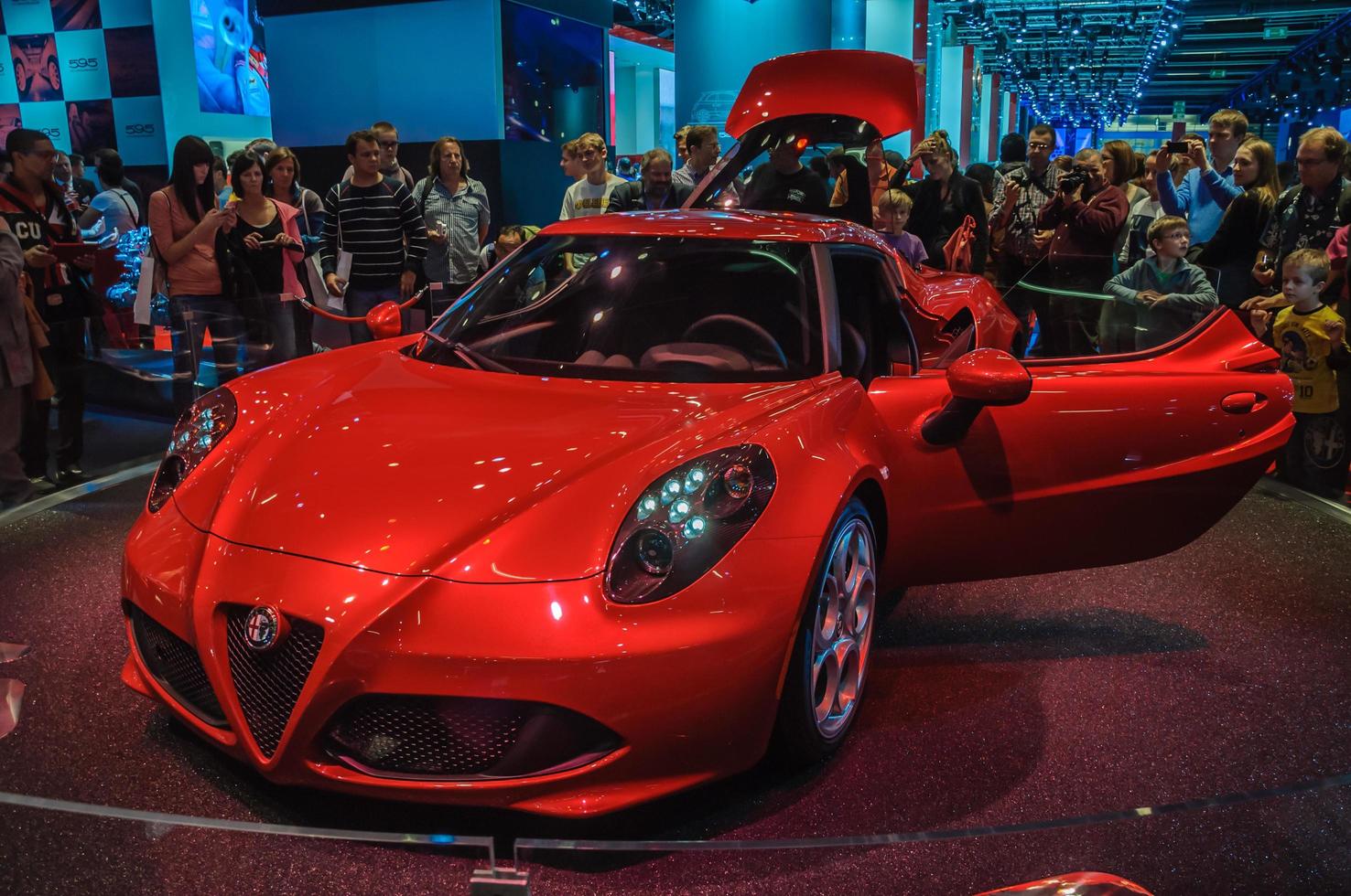 FRANKFURT - SEPT 21 ALFA ROMEO 4C presented as world premiere at the 65th IAA Internationale Automobil Ausstellung on September 21, 2013 in Frankfurt, Germany photo