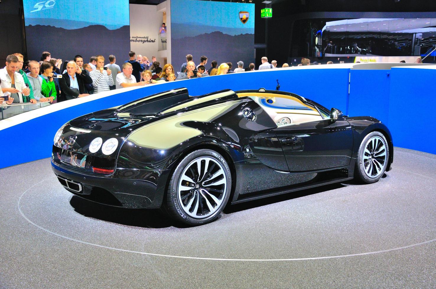 FRANKFURT - SEPT 14 Bugatti Veyron Grand Sport LOr Blanc presented as world premiere at the 65th IAA Internationale Automobil Ausstellung on September 14, 2013 in Frankfurt, Germany photo