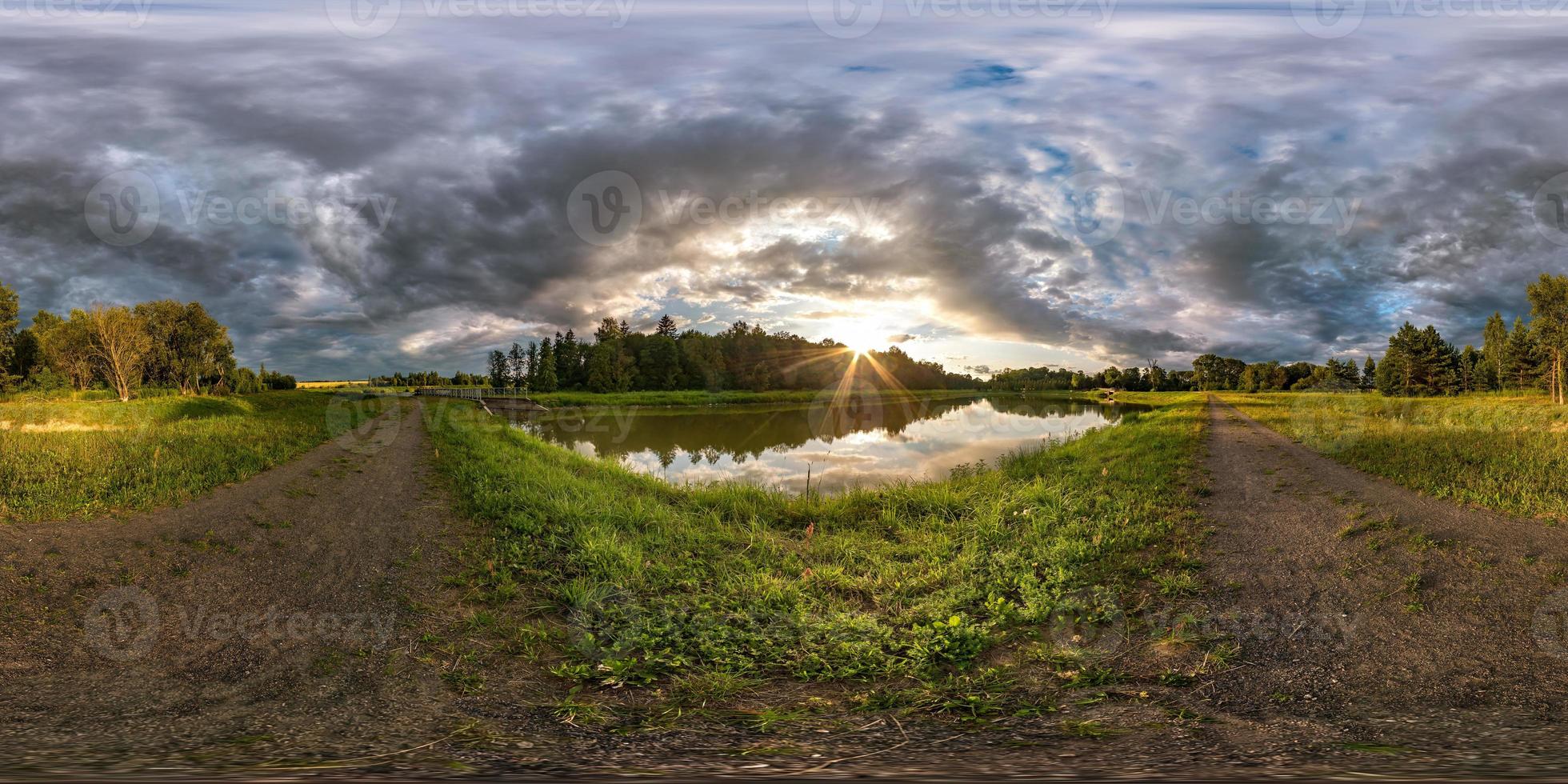 full seamless spherical hdri panorama 360 degrees angle view on the shore of lake in evening before storm with black clouds in equirectangular projection, ready VR virtual reality content photo